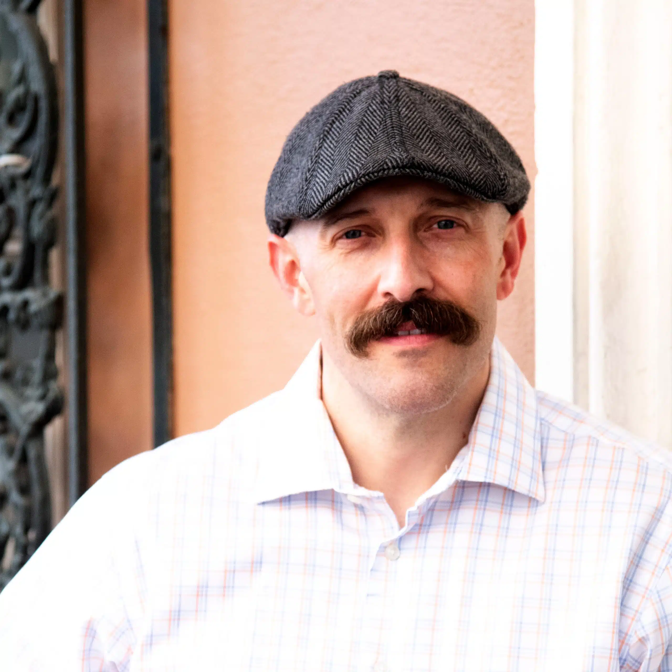 A man with a mustache solutions.