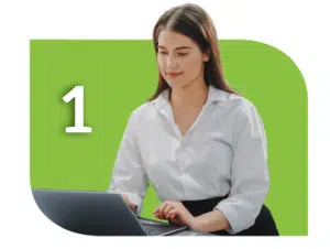 A woman is using a laptop with the number 1 on it to contact someone. A woman is using a laptop with the number 1 on it to contact someone.