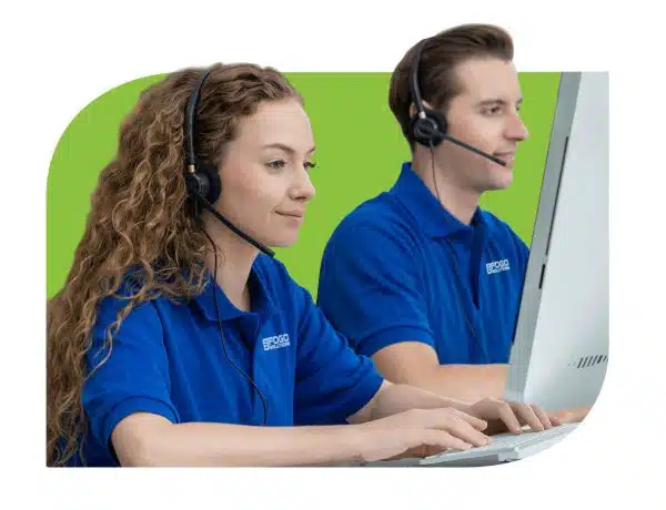 man and woman at workstations