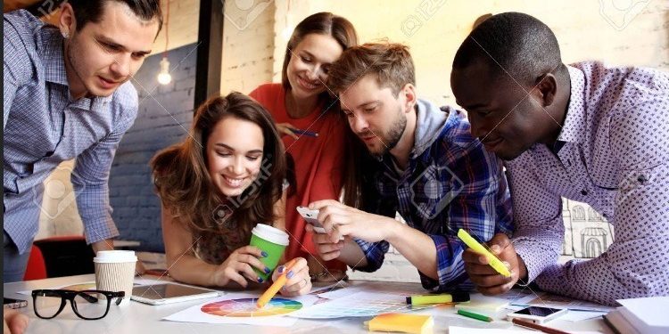 A managed IT team collaborating in an office. A managed IT team collaborating in an office.